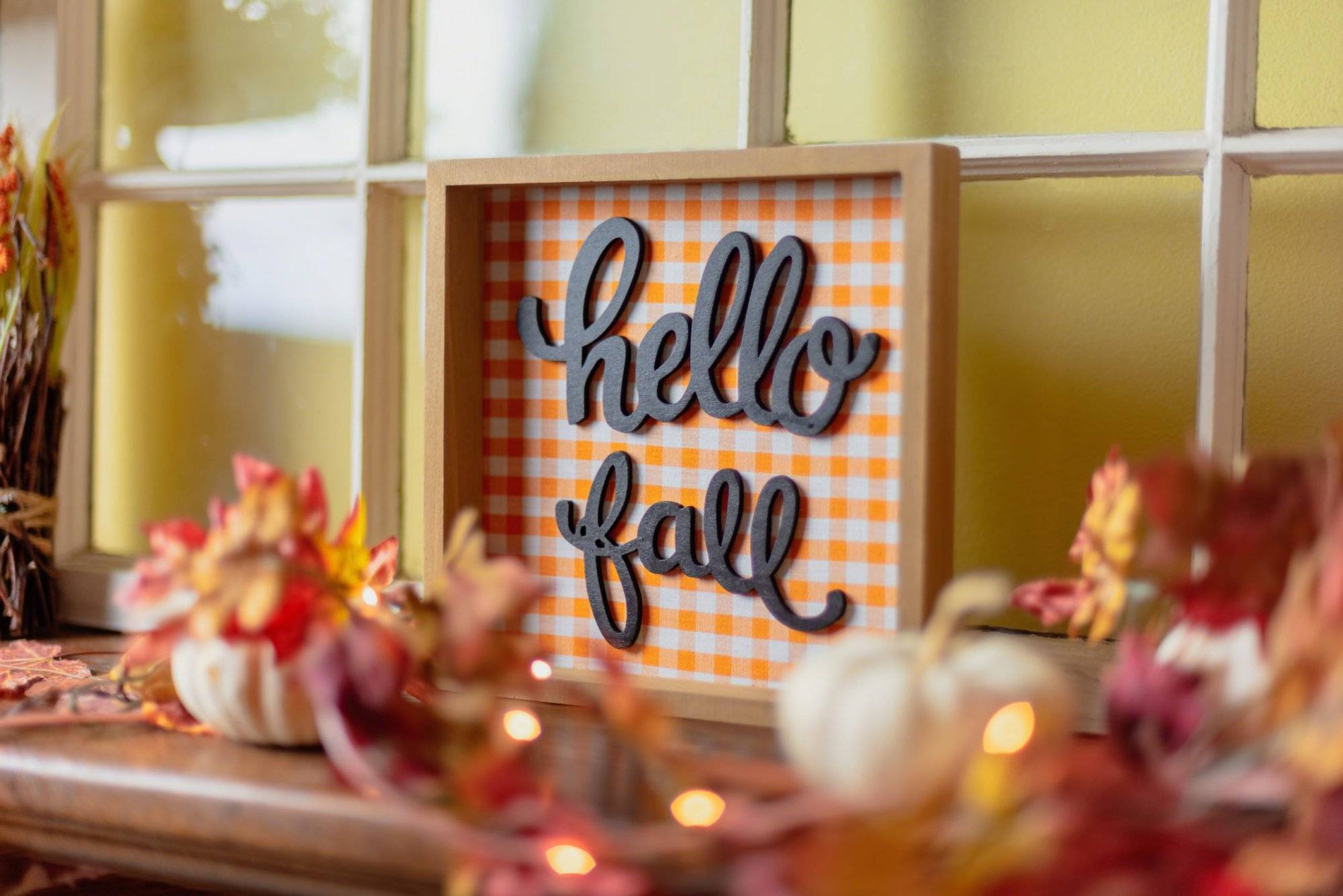 Closeup of fall decorations on mantel