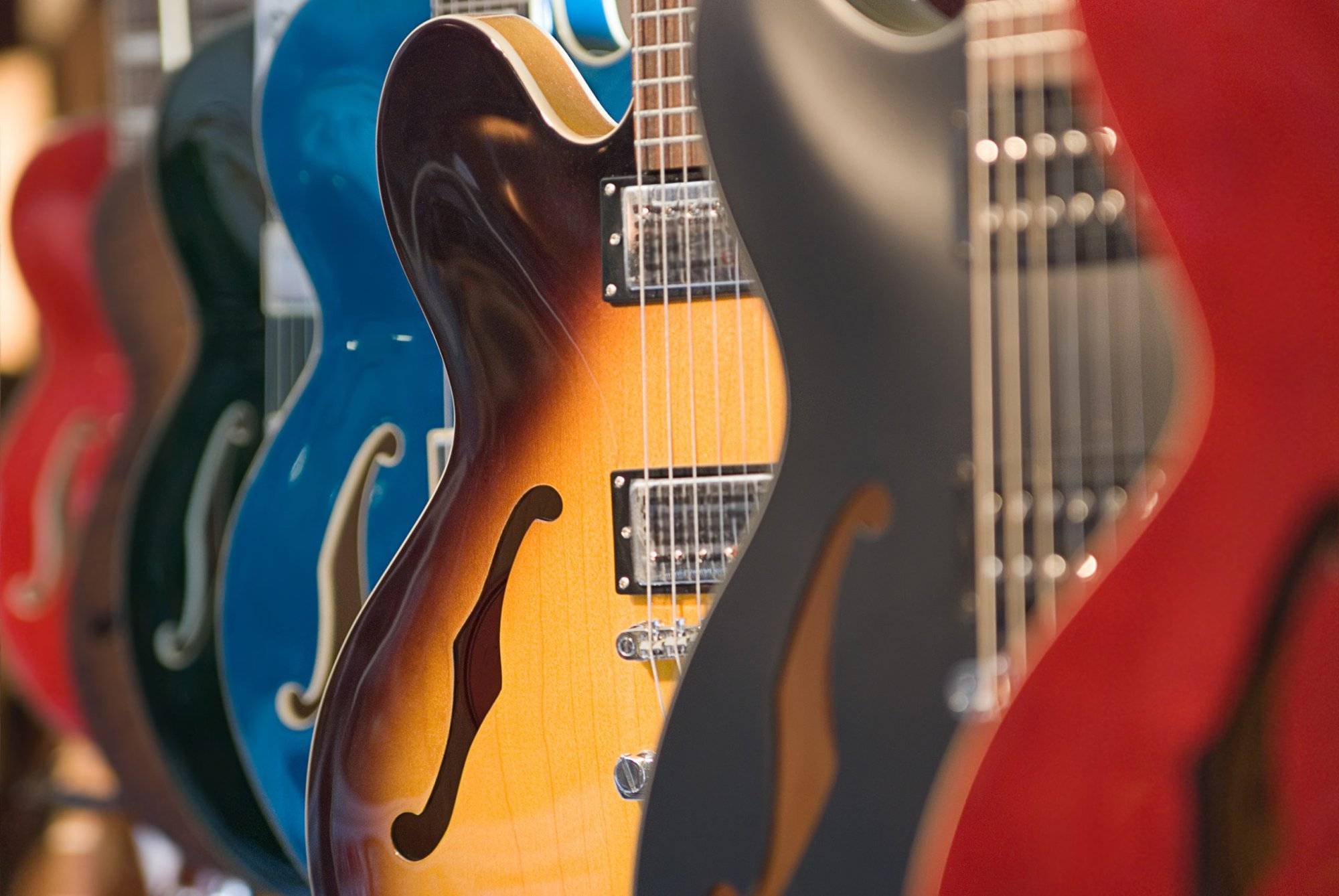 Guitars Hanging in a Store